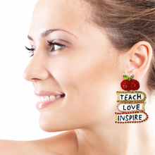 Load image into Gallery viewer, custom beaded Earrings, jeweled Earrings, Teach love inspire Beaded Earrings, teacher earrings, teacher jeweled earrings, handmade earrings, custom earrings, bejeweled accessories, teacher jewelry accessories, teacher appreciation gift , custom earrings, teacher gifts, birthday gifts, bohemian earrings, luxurious handmade accessories, party earrings, teacher appreciation week gifts, teaching earrings, rhinestone earrings, embellished earrings, party earrings, statement earrings, best selling items