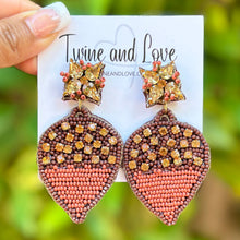 Load image into Gallery viewer, Thanksgiving beaded Earrings, acorn Earrings, Thanksgiving Earrings, acorn Bead Earrings, earrings for Thanksgiving, acorn jeweled earrings, Thanksgiving earrings, Unique earrings, thanksgiving acorn earrings, Thanksgiving jewelry, statement earrings, acorn love earrings, fall earrings, costume jewelry, Holiday earrings, autumn earrings, custom designs, autumn beaded earrings, dangling earrings, unique earrings, autumn accessories, fall vibes, fall autumn accessories, best selling Thanksgiving earrings