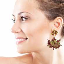 Load image into Gallery viewer, maple beaded Earrings, autumn Earrings, Autumn leaf Earrings, Fall Earrings, earrings for Thanksgiving, Thanksgiving earrings, orange earrings, Unique earrings, maple leaf earrings, Autumn jewelry, statement earrings, Brown earrings, Fall beaded earrings, Autumn jewelry, Holiday earrings, pumpkin earrings, custom designs, maple earrings, dangling earrings, unique earrings, Thanksgiving accessories, Autumn accessories, Autumn brown earrings, Fall accessories, best selling fall earrings