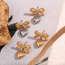 Load image into Gallery viewer, bow heart stud Earrings, 18k gold stud Earrings, minimalist style Earrings, heart bow stud 18k gold earrings, custom earrings, earrings party accessories, fancy accessories, 18k gold plated earrings, custom earrings, best friend gifts, birthday gifts, bow earrings, luxurious handmade accessories, embellished night jewelry, heart earrings, bridal gold plated earrings, beaded jeweled earrings, best selling items, handmade gifts, custom gifts, valentines day gifts, gifts for her, minimalist jewelry