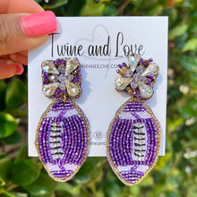 Load image into Gallery viewer, football Beaded Earrings, beaded football Earrings, football Earrings, football love Beaded Earrings, football bead earrings, football lover bead earrings, geaux tigers, purple earrings, Geaux earrings, tigers football earrings, football seed bead earrings, football accessories, Clemson accessories, sport earrings, gifts for mom, best friend gifts, birthday gifts, sport jewelry, sport bead earrings, football accessory, Clemson earrings, football fan earrings, go Frogs football, TCU