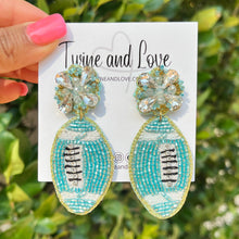 Load image into Gallery viewer, football Beaded Earrings, light blue football Earrings, football Earrings, UNC football, football earrings, Commanders football earrings, Roll Wave football, blue football earrings, Tulane earrings, Roll wave earrings, football seed bead earrings, football accessories, ASU accessories, North Carolina earrings, Best selling items, birthday gifts, sport jewelry, sport bead earrings, football accessory, College gifts, Tar Heels earrings, game day earrings, North Carolina, Citadel Bulldogs 