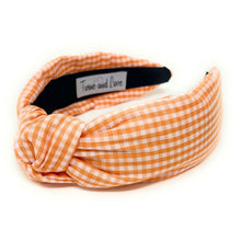 Load image into Gallery viewer, headband for women, gingham headband, orange knot headband, Tennessee Vols knotted headband, Vols, Orange knot headband, game day headband, game day knotted headband, orange Knot headband, Orange white hair band, Gingham knot headbands, Tennessee headband, college knot headbands, white and orange knotted headband, Vols knotted headband, game day hair accessories, Halloween headband, Birthday gifts, knot headband, embellished knot headband, custom headband, handmade headbands, knotted headband