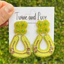 Load image into Gallery viewer, custom beaded Earrings, horseshoe Earrings, lion Beaded Earrings, green earrings, horseshoe jeweled earrings, women earrings, handmade earrings, custom earrings, bejeweled accessories, fancy accessories, St Patrick’s Day earrings, gifts for mom, best friend gifts, birthday gifts, bohemian earrings, St Patrick’s day accessories, party earrings, Fancy earrings, boho earrings, rhinestone earrings, embellished earrings, Fancy jeweled earrings, party earrings, statement earrings, best selling items