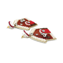 Load image into Gallery viewer, Decorative earrings shaped like gingerbread houses with red and gold colors on a white background