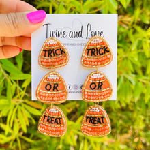 Load image into Gallery viewer, Halloween beaded Earrings, beaded halloween Earrings, halloween Earrings, Halloween Bead Earrings, earrings for halloween, trick or treat earrings, orange earrings, Unique earrings, candy earrings, Halloween jewelry, statement earrings, trick or treat earrings, spooky earrings, costume jewelry, Holiday earrings, pumpkin earrings, custom designs, cat earrings, dangling earrings, unique earrings, autumn accessories, witch vibes, spooky vibes, trick or treat accessories, candy corn earrings