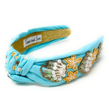 Load image into Gallery viewer, headband for women, seashell Knot headband, seashell lover headband, turquoise knotted headband, seashell top knot headband, Summer top knotted headband, seashell pearl knotted headband, Summer hair band, beaded shell knot headband, shell motif headband, statement headbands, top knotted headband, knotted headband, seashell lover gifts, seashell embellished headband, luxury headband, Birthday gifts, Summer Knot headband, Summer knot embellished headband, Mothers day gifts ideas, turquoise knot headband