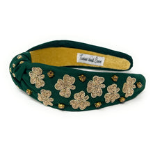 Load image into Gallery viewer, headbands for women, green knotted headband, headband style, top knot headband, green top knot headband, lucky charm headband, lucky charm hair band, green knot headband, top knotted headband, St Patrick’s headband, handmade headbands, top knotted headband, hand bead knotted headband, Clover leaf hair band for women, Hand bead St. Patrick’s headband, statement headbands, embellished headband, chic headband, clover leaf knot headband, st paddy’s headband, green hair accessories, shamrock headband