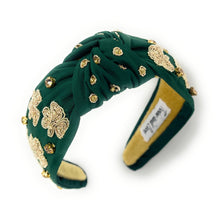 Load image into Gallery viewer, headbands for women, green knotted headband, headband style, top knot headband, green top knot headband, lucky charm headband, lucky charm hair band, green knot headband, top knotted headband, St Patrick’s headband, handmade headbands, top knotted headband, hand bead knotted headband, Clover leaf hair band for women, Hand bead St. Patrick’s headband, statement headbands, embellished headband, chic headband, clover leaf knot headband, st paddy’s headband, green hair accessories, shamrock headband