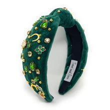 Load image into Gallery viewer, headbands for women, green knotted headband, headband style, top knot headband, green top knot headband, lucky charm jeweled headband, lucky charm hair band, green Jeweled knot headband, St Patrick’s Jeweled headband, top knotted headband, hand bead knotted headband, Clover leaf hair band for women, St Patrick’s Embellished headband, statement headbands, embellished headband, chic headband, clover leaf knot headband, st paddy’s headband, green hair accessories, shamrock clover headband