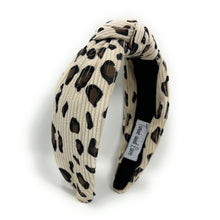 Load image into Gallery viewer, headband for woman, leopard headband, animal print headband, best selling items, corduroy headbands, ivory headband, Ivory top knot headband, woven top knot headband, animal print accessories, trendy headbands, leopard to knot headband, animal print headband, ivory knotted headband, ivory print top knot headband, handmade headbands, top knotted headband, knotted headband, leopard print headband, ivory top knotted headband, leopard headband, corduroy knot headband, leopard print headband