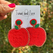 Load image into Gallery viewer, custom beaded Earrings, fruity jeweled Earrings, red apple Beaded Earrings, teacher earrings, teacher jeweled earrings, handmade earrings, custom earrings, bejeweled accessories, teacher jewelry accessories, teacher appreciation gift, teacher gifts, birthday gifts, bohemian earrings, luxurious handmade accessories, party earrings, teacher appreciation week gifts, teaching earrings, rhinestone earrings, embellished earrings, party earrings, statement earrings, best selling items, lightweight earrings