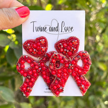 Load image into Gallery viewer, custom beaded Earrings, red jeweled Earrings, red Beaded Earrings, bow earrings, summer jeweled earrings, handmade earrings, custom earrings, party accessories, fancy accessories, bow embellished earrings, custom earrings, best friend gifts, birthday gifts, bohemian earrings, luxurious handmade accessories, night jewelry, Fancy earrings, boho earrings, beaded earrings, bow jeweled earrings, statement earrings, best selling items, statement earrings, handmade gifts, custom gifts, red bow