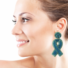 Load image into Gallery viewer, teal ribbon Beaded Earrings, beaded lavender Earrings, teal color Earrings, support cancer awareness Beaded Earrings, cancer ribbon earrings, support ovarian awareness earrings, cervical cancer ribbon earrings, uterine cancer awareness earrings, Beaded earrings, ovarian cancer ribbon earrings, teal ribbon bead earrings, teal ribbon accessories, cancer awareness accessories, support ovarian cancer awareness earrings, gifts for mom, best friend gifts, birthday gifts, teal earrings, teal beaded earrings, suppo