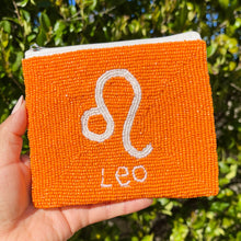 Load image into Gallery viewer, Zodiac Signs Coin Purse Pouch, leo Beaded Coin Purse, leo bead Coin Purse, leo Beaded Purse, Astrology Signs Coin Purse, Best Friend Gift, Leo beaded coin pouch, Zodiac Wallets for her, beaded coin purse, girl birthday gifts, boho pouch, boho accessories, best friend gifts, coin purse, zodiac signs gifts, money coin pouch, gift bags, best selling items, bachelorette gifts, birthday gifts, preppy beaded wallet, party favors, party favors, zodiac signs accessories.