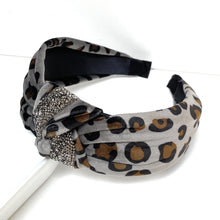 Load image into Gallery viewer, headband for woman, fashion headbands, womens headband, headbands for women, stylish headbands, headband style, top knot headband, woven top knot headband, head band, hair band, trendy headbands, raffia woven headband, women top knot headband, summer headbands, beige headband, beige top knot headband, handmade headbands, top knotted headband, knotted headband, leopard print headband, brown top knotted headband, leopard headband, velour headbands, leopard velvet headbands, best selling items