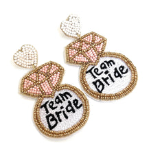 Load image into Gallery viewer, team bride beaded earrings, bridal earrings, bridal shower gift, bachelorette earrings, bridal gift, bride to be gift, bachelorette gift, bridal shower, bride statement earrings, bridal gift, bachelorette party, earrings for bride, best friend gift, bachelorette gift, white bride earrings, birthday gift for bride, party treats for bride. bride to be gift, bridal shower party favors, gift for bride, gift for bachelorette, bride entourage gift, bridesmaids gifts, team bride earrings, bride squad gifts