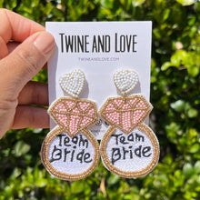 Load image into Gallery viewer, team bride beaded earrings, bridal earrings, bridal shower gift, bachelorette earrings, bridal gift, bride to be gift, bachelorette gift, bridal shower, bride statement earrings, bridal gift, bachelorette party, earrings for bride, best friend gift, bachelorette gift, white bride earrings, birthday gift for bride, party treats for bride. bride to be gift, bridal shower party favors, gift for bride, gift for bachelorette, bride entourage gift, bridesmaids gifts, team bride earrings, bride squad gifts