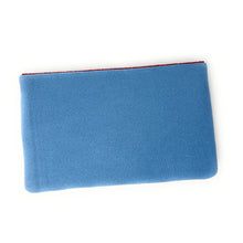 Load image into Gallery viewer, clutch purse featuring a shark graphic design with textured blue bead embellishments.