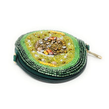 Load image into Gallery viewer, A beaded pouch with zipper shaped like an avocado half, with green and brown beads depicting the fruit and seed, creating a vibrant, textured design.