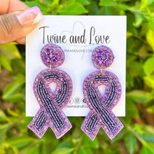 Load image into Gallery viewer, Purple awareness ribbon earrings featuring sparkling beadwork, rhinestone accents, and matching jeweled stud tops.