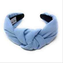 Load image into Gallery viewer, Elegant baby blue padded headband featuring a statement knot and timeless minimalist style.