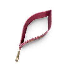 Load image into Gallery viewer, Hand beaded banana wristlet keychain featuring three yellow bananas on a pink beaded strap with green and purple accents. Includes a gold-tone lobster clasp and comfortable wrist loop, perfect for holding keys, key fobs, or ID badges.