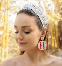 Load image into Gallery viewer, Woman wearing a decorative headband and earrings with a blurred natural background