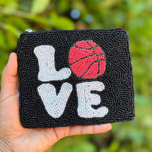 Load image into Gallery viewer, Hand-beaded Love Basketball pouch with a red basketball design and white lettering on a black background by Twine and Love.