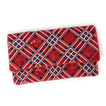Load image into Gallery viewer, Red patterned clutch bag on a white background