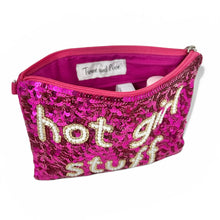 Load image into Gallery viewer, Sparkling fuchsia sequin clutch with hand-beaded “hot girl stuff” text, designed for cosmetics, accessories, and everyday organization.