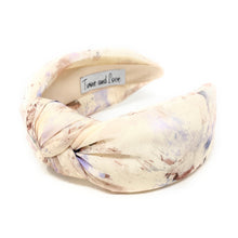 Load image into Gallery viewer, Elegant twisted headband with a pastel watercolor pattern.