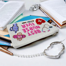 Load image into Gallery viewer, Hand beaded pouch with the words &quot;Best Nurse Ever&quot; and images of a stethoscope, heart, thermometer, bandage, and blood pressure monitor, celebrating healthcare.