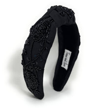 Load image into Gallery viewer, Chic floral beaded headband featuring black sequin embroidery, dimensional rose accents, and a stylish twisted knot design.