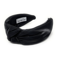 Load image into Gallery viewer, Black satin headband with a knotted design on a white background