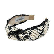 Load image into Gallery viewer, A black ivory raffia woven headband with a monochrome ivory and beige pattern, featuring a knotted design.
