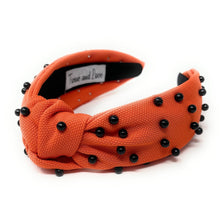 Load image into Gallery viewer, headbands for women, black orange headband, handmade headbands, orange black top knotted headband, Cincinnati Bengals knotted headband, Bengals Headband, Cincinnati football headband, black pearl headband, black orange game day headband, football headband, jeweled headband, knotted jeweled headband, Cincinnati football headband, Orange  Black knot headband, Princeton knot headband, pearly headbands, OKlahoma State headband, game day hair accessories, game day headband, football headbands, best selling items