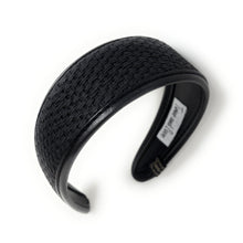 Load image into Gallery viewer, Black woven headband with textured pattern, lying on a white surface. The headband exudes a casual, earthy elegance.