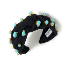 Load image into Gallery viewer, Elegant black headband adorned with turquoise and gold beads, featuring a twist knot detail. The design is stylish and sophisticated.