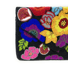 Load image into Gallery viewer, Artisan-crafted floral clutch with colorful hand-beaded flowers and leaves against a richly textured black backdrop.