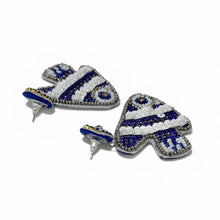 Load image into Gallery viewer, Pair of blue and white fish-shaped earrings on a white background