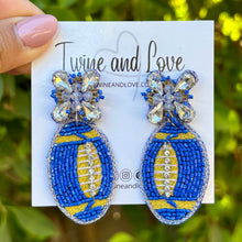 Load image into Gallery viewer, football Beaded Earrings, blue gold football Earrings, football Earrings, LA Rams football, football earrings, Gold and Blue football earrings, Blue Yellow football accessories, LA Rams football earrings, Los Angeles Rams earrings, Royal football earrings, football seed bead earrings, football accessories, Football women accessories, Game day earrings, Best selling items, birthday gifts, sport jewelry, sport bead earrings, football accessory, College gifts, Football gifts for her, gameday earrings
