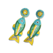 Load image into Gallery viewer, Colorful fish-shaped statement earrings featuring turquoise, green, and yellow beadwork with playful coastal-inspired details.