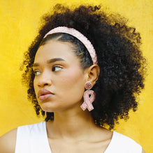 Load image into Gallery viewer, Delicate blush pink headband adorned with shimmering crystal beads arranged in elegant floral patterns.
