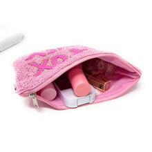 Load image into Gallery viewer, Large pink pouch with makeup products inside