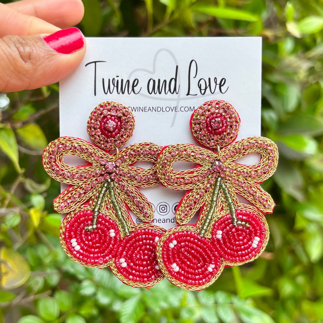 custom beaded Earrings, cherry jeweled Earrings, bow Beaded Earrings, bow cherry earrings, summer jeweled earrings, handmade earrings, custom earrings, party accessories, fancy accessories, bow embellished earrings, custom earrings, best friend gifts, birthday gifts, bohemian earrings, luxurious handmade accessories, night jewelry, Fancy earrings, boho earrings, beaded earrings, bow jeweled earrings, statement earrings, best selling items, statement earrings, handmade gifts, custom gifts, pink bow
