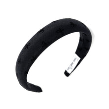 Load image into Gallery viewer, Elegant black fabric headband with subtle bow pattern. Minimalist and chic.