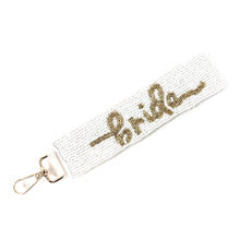 Load image into Gallery viewer, Beaded wristlet with 'bride' text on a white background