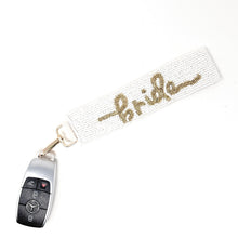 Load image into Gallery viewer, Keychain with 'Bride' text on a white background