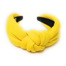 Load image into Gallery viewer, Statement yellow fabric headband with a twisted knot detail and soft padded silhouette.